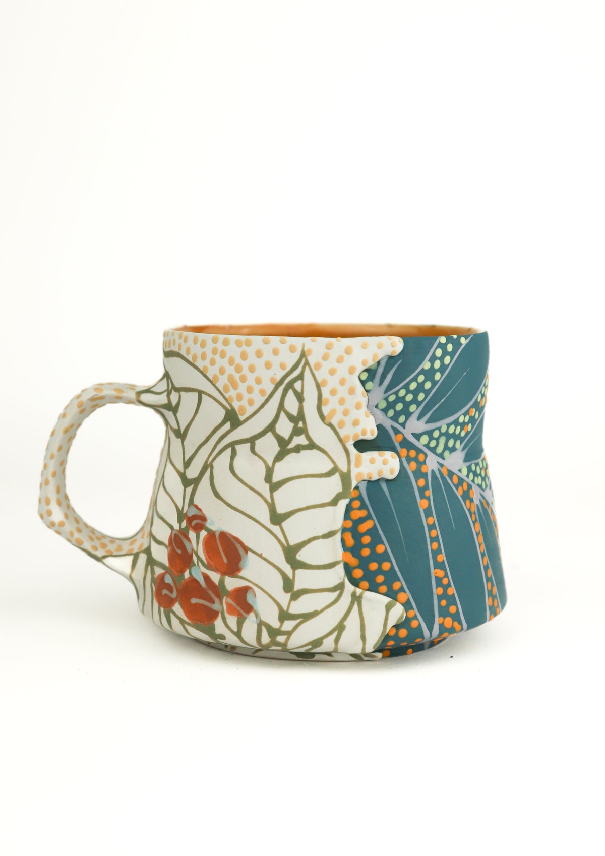 White and teal split mug